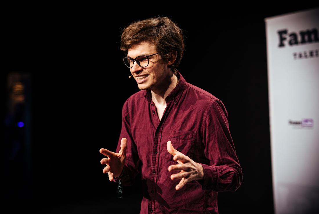 André speaking at FameLab